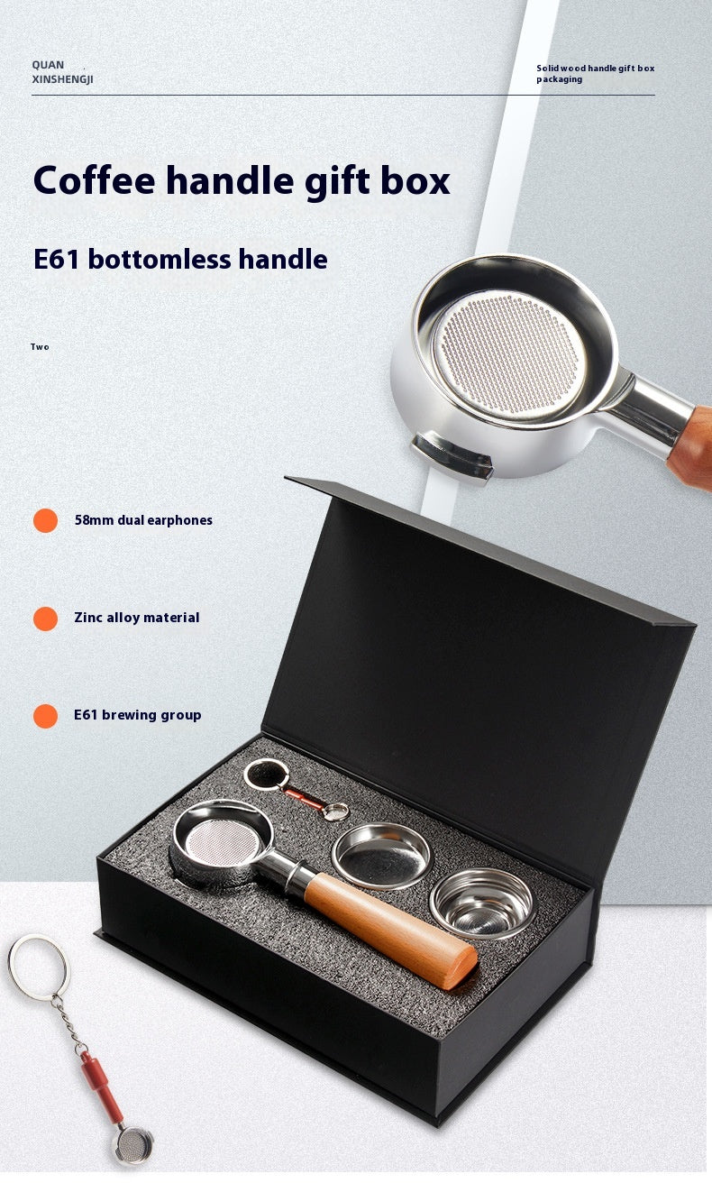 Coffee handle gift box set featuring an open black presentation box with a metal portafilter and accessories, alongside a loose metal portafilter and a small keychain accessory on a clean white background with product text.