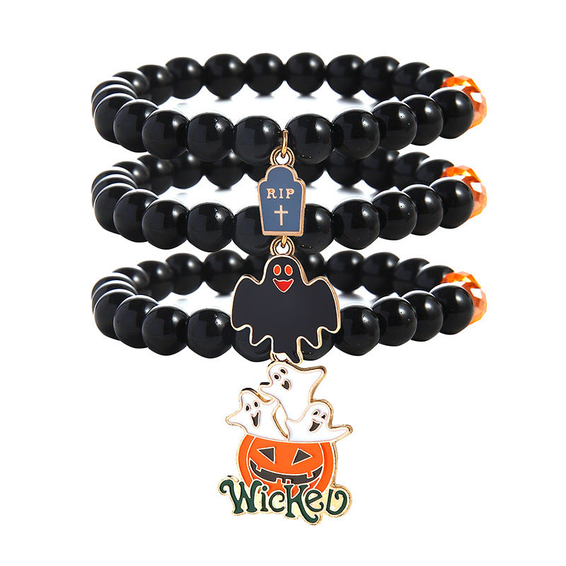 426179006-4 Three black beaded Halloween bracelets with RIP tombstone, black ghost and white ghosts above a pumpkin reading Wicked.
